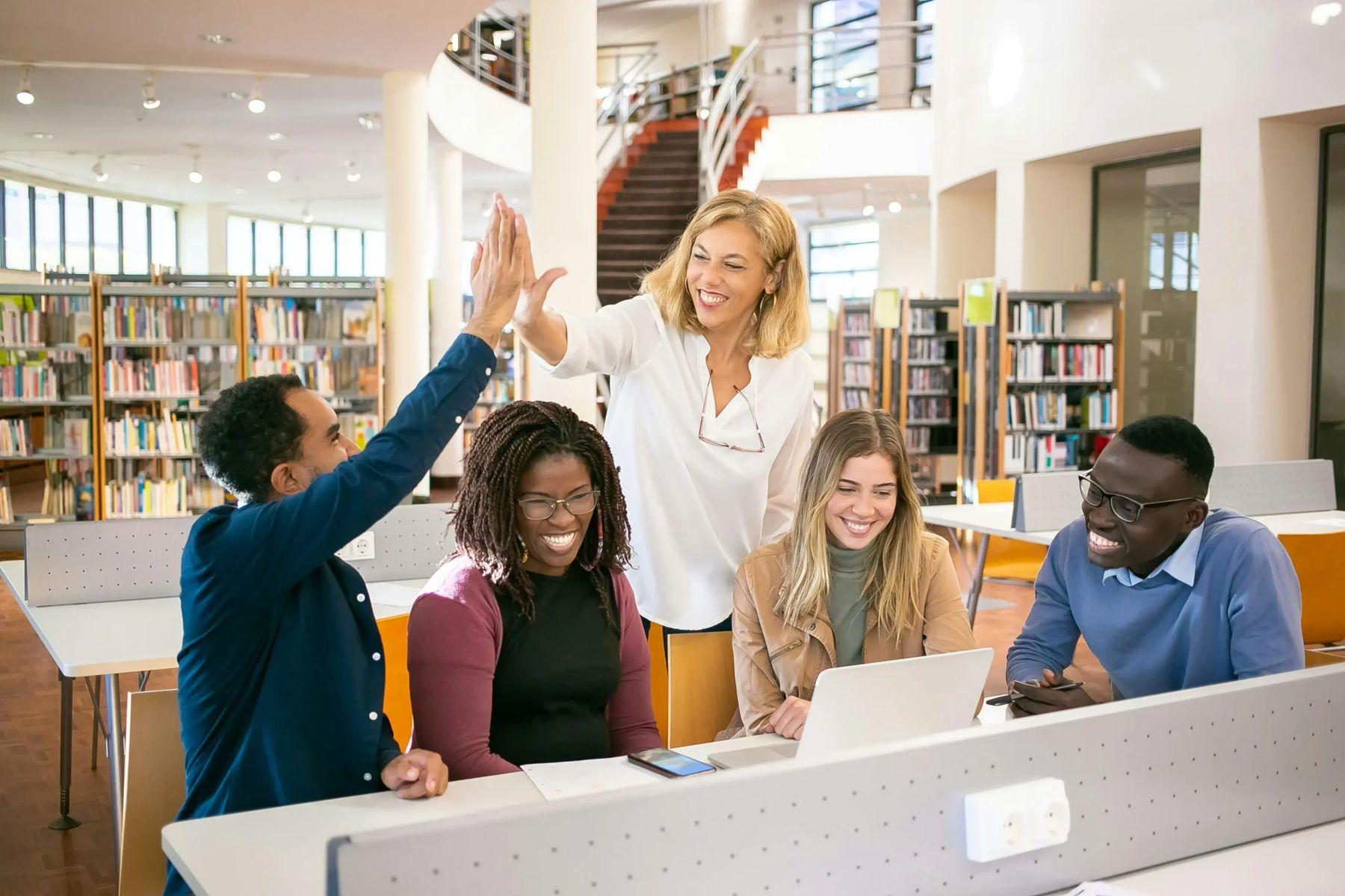 Students celebrating together in a study session