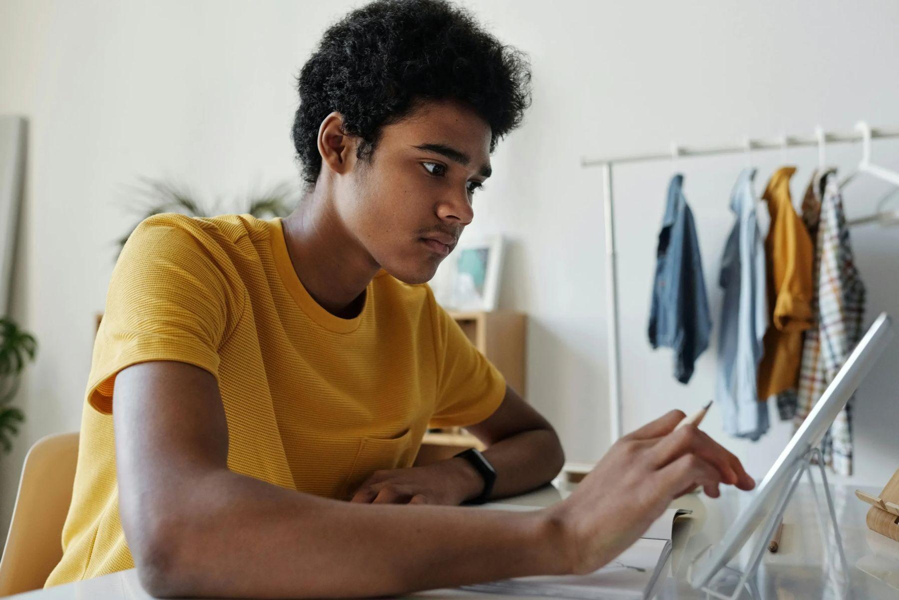 Student working through practice questions on a tablet